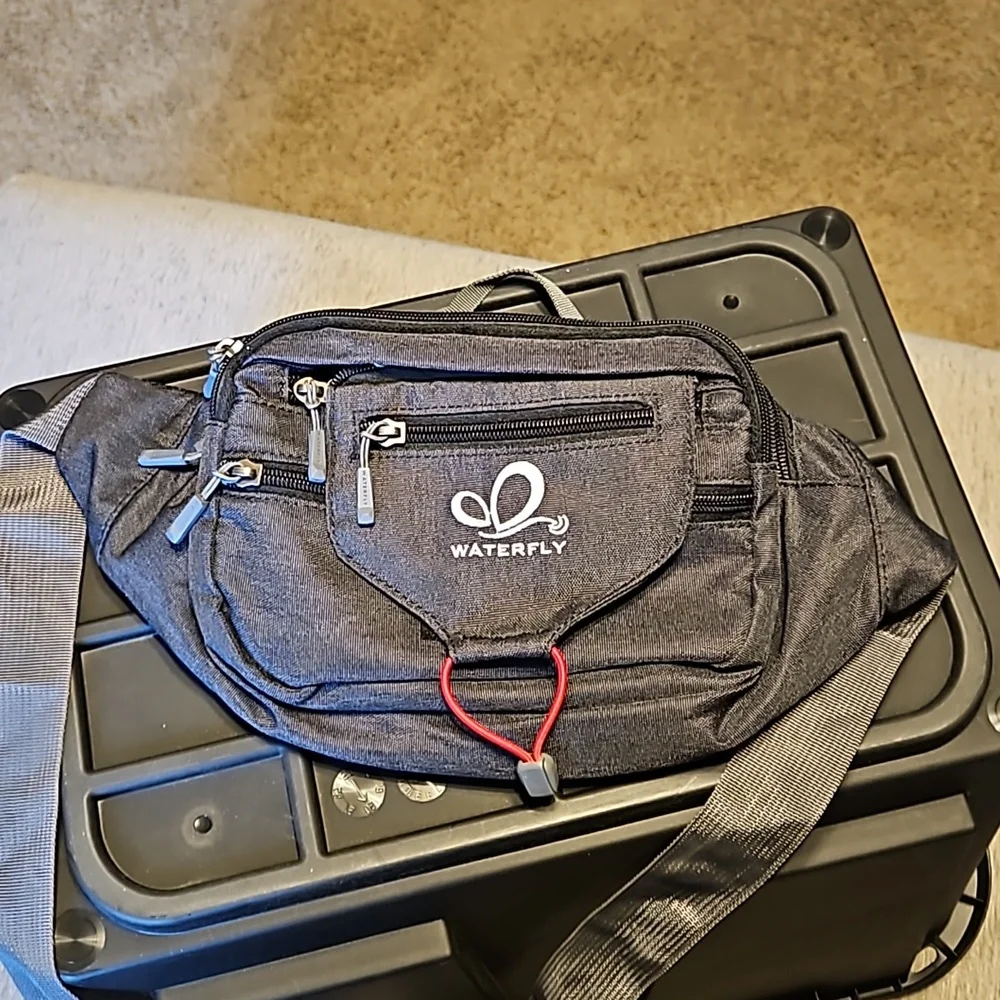 Waterfront Multiple pocket fanny pack in charcoal black. - Picture 1 of 6
